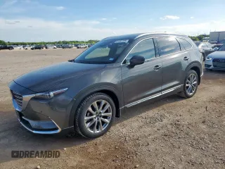 2018 Mazda CX-9 Grand Touring z VIN JM3TCBDY2J0207515, wystawiony jako Copart lot #61597725 z przebiegiem 83 735 mil mil oraz Czysty tytuł • Clean title. Historia ofert i sprzedaży dostępna na DreamBid. Obrazek 1.