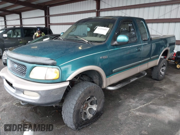 1997 Ford F-150 XL with VIN 1FTDX18W9VKC62901, listed as a IAAI auction lot 41495680 with 205,443 mi miles. Bid and sale history available at carsss.com. Image 2.