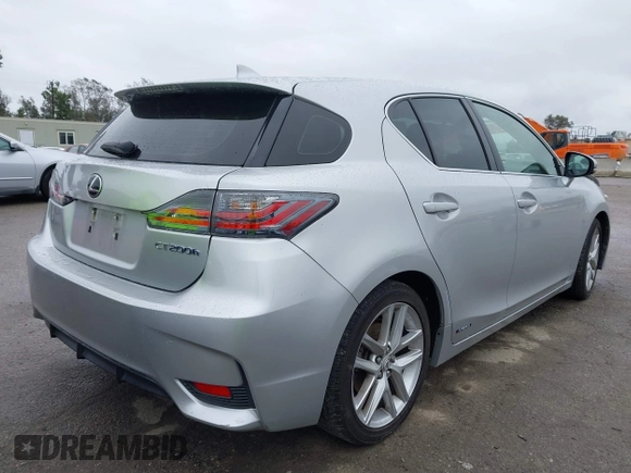 2014 Lexus CT 200h Hybrid with VIN JTHKD5BH0E2173721, listed as a IAAI auction lot 41798469 with 124,337 mi miles. Bid and sale history available at carsss.com. Image 4.