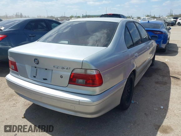 2003 BMW 5 Series 530iA with VIN WBADT63443CK38704, listed as a IAAI auction lot 41779122 with 103,198 mi miles. Bid and sale history available at carsss.com. Image 4.