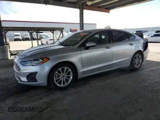 2019 Ford Fusion Hybrid SE with VIN 3FA6P0LU7KR262160, listed as a Copart auction lot 51969555 with 99,699 mi miles and Salvage Title. Bid and sale history available at carsss.com. Image 1.