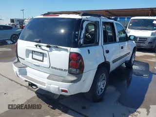 2004 Chevrolet TrailBlazer LT with VIN 1GNDS13S342361478, listed as a IAAI auction lot 42094261 with 298,130 mi miles and . Bid and sale history available at DreamBid. Image 4.