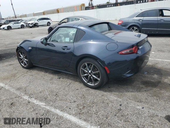 2021 Mazda MX-5 Miata Grand Touring with VIN JM1NDAM70M0460532, listed as a Copart auction lot 58828045 with 70,269 mi miles and Salvage title. Bid and sale history available at DreamBid. Image 2.