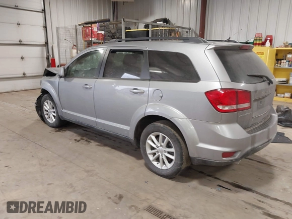 2016 Dodge Journey SXT with VIN 3C4PDCBG0GT198686, listed as a IAAI auction lot 41561007 with 85,289 mi miles. Bid and sale history available at carsss.com. Image 3.