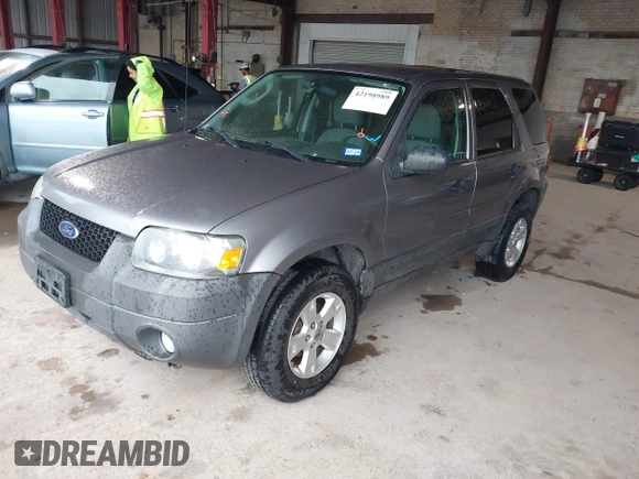 2007 Ford Escape XLT with VIN 1FMYU03187KA14931, listed as a IAAI auction lot 42198989 with 89,023 mi miles and . Bid and sale history available at DreamBid. Image 2.