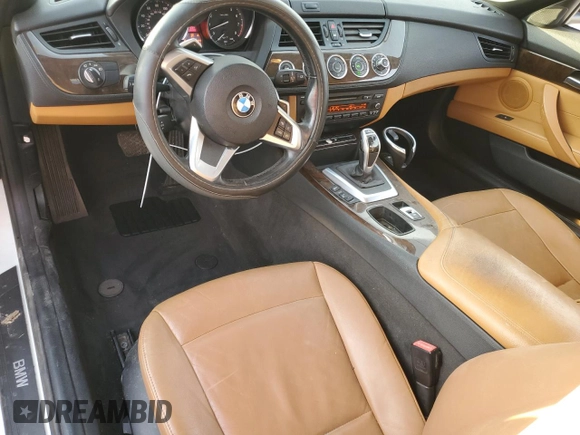 2012 BMW Z4 sDrive28i with VIN WBALL5C59CJ103051, listed as a Copart auction lot 87015834 with 92,071 mi miles and Salvage title. Bid and sale history available at DreamBid. Image 8.