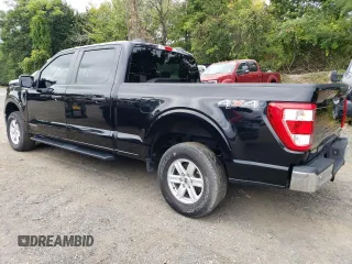2021 Ford F-150 XL with VIN 1FTFW1ED0MFB39526, listed as a Copart auction lot 83764754 with 65,581 mi miles and Salvage Title. Bid and sale history available at carsss.com. Image 2.