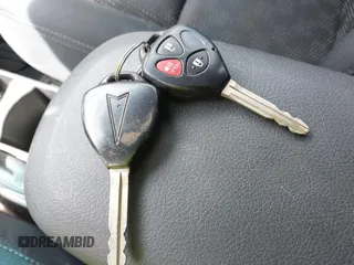 2009 Pontiac Vibe 1SA z VIN 5Y2SP67829Z430396, wystawiony jako IAAI lot #42363585 z przebiegiem 188 268 mil mil oraz . Historia ofert i sprzedaży dostępna na DreamBid. Obrazek 11.