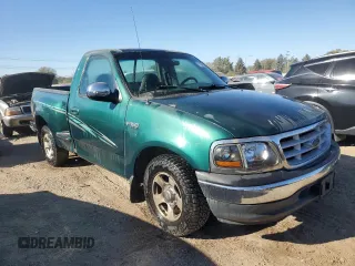 1999 Ford F-150 XL with VIN 2FTZF0720XCA14612, listed as a Copart auction lot 75092304 with 230,897 mi miles and Salvage Title. Bid and sale history available at carsss.com. Image 4.