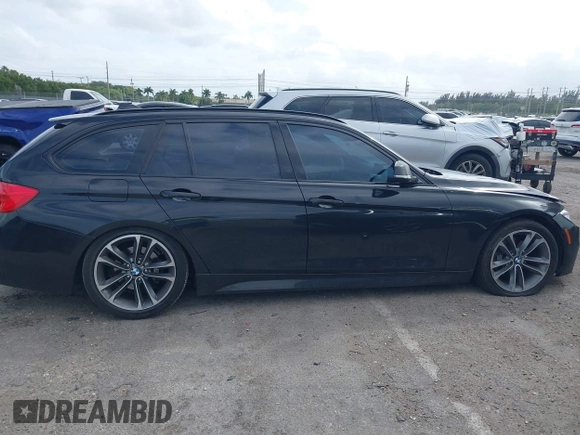 2014 BMW 3 Series 328i xDrive with VIN WBA3G7C57EKN37319, listed as a IAAI auction lot 41699235 with 93,671 mi miles and . Bid and sale history available at carsss.com. Image 13.