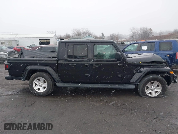 2022 Jeep Gladiator Texas Trail with VIN 1C6HJTAG1NL102451, listed as a IAAI auction lot 40969999 with 69,797 mi miles. Bid and sale history available at carsss.com. Image 13.
