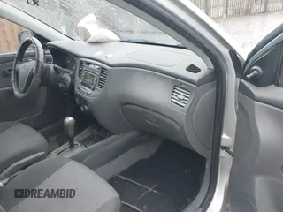 2009 Kia Rio SX with VIN KNADE223596538965, listed as a IAAI auction lot 42029409 with 143,794 mi miles. Bid and sale history available at carsss.com. Image 5.