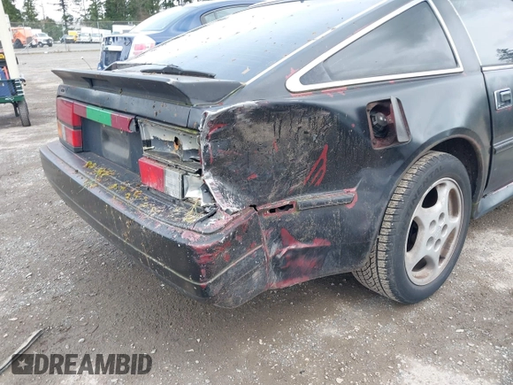1986 Nissan 300ZX z VIN JN1HZ14S4GX140955, wystawiony jako IAAI lot #41935505 z przebiegiem 144 917 mil mil oraz . Historia ofert i sprzedaży dostępna na DreamBid. Obrazek 14.