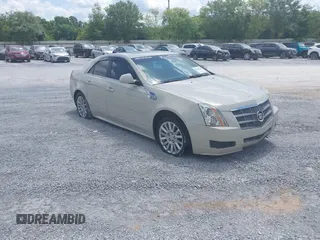 2010 Cadillac CTS Luxury z VIN 1G6DE5EG7A0149418, wystawiony jako IAAI lot #42311562 z przebiegiem 158 517 mil mil oraz . Historia ofert i sprzedaży dostępna na DreamBid. Obrazek 1.