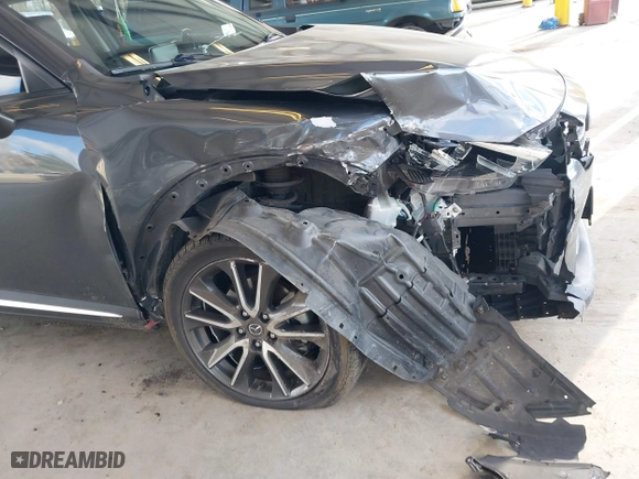2017 Mazda CX-3 Grand Touring with VIN JM1DKFD70H0150496, listed as a IAAI auction lot 41746038 with 108,091 mi miles. Bid and sale history available at carsss.com. Image 6.