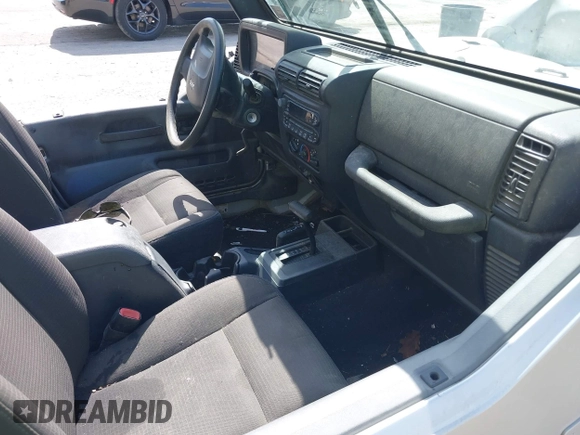 2006 Jeep Wrangler X with VIN 1J4FA39S36P703941, listed as a IAAI auction lot 42220361 with 148,829 mi miles and . Bid and sale history available at DreamBid. Image 5.