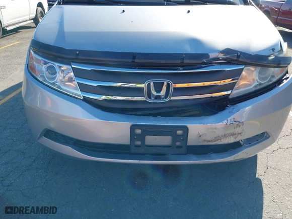 2011 Honda Odyssey EX-L with VIN 5FNRL5H62BB010876, listed as a IAAI auction lot 41981812 with 195,734 mi miles. Bid and sale history available at carsss.com. Image 6.