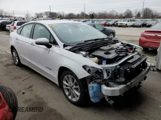 2019 Ford Fusion Hybrid SE with VIN 3FA6P0LU9KR179989, listed as a Copart auction lot 71063802 with 71,245 mi miles. Bid and sale history available at carsss.com. Image 4.