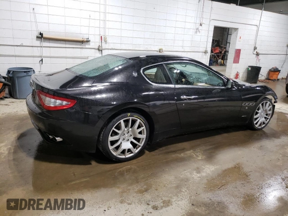 2009 Maserati GranTurismo с VIN ZAMGJ45A190042805, выставлен на аукционе Copart как лот 70785674 с пробегом 71 810 миль миль и Списание • Salvage title. История ставок и продаж доступна на DreamBid. Изображение 3.