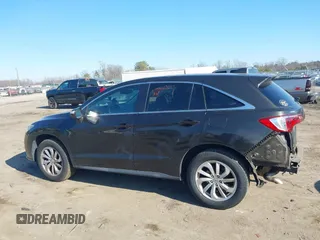 2016 Acura RDX with VIN 5J8TB4H36GL011656, listed as a IAAI auction lot 41421569 with 128,005 mi miles. Bid and sale history available at carsss.com. Image 15.