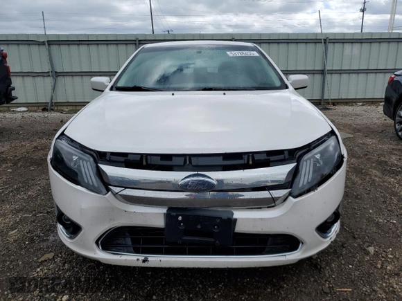 2010 Ford Fusion Hybrid z VIN 3FADP0L38AR170570, wystawiony jako Copart lot #53788455 z przebiegiem 127 407 mil mil oraz Szkoda całkowita • Salvage title. Historia ofert i sprzedaży dostępna na DreamBid. Obrazek 5.