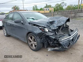 2014 Chevrolet Cruze 2LT z VIN 1G1PE5SB4E7321011, wystawiony jako IAAI lot #42369346 z przebiegiem Nie podano mil oraz . Historia ofert i sprzedaży dostępna na DreamBid. Obrazek 1.