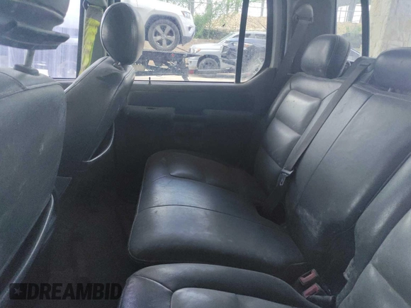 2004 Ford Explorer Sport Trac XLS z VIN 1FMZU67KX4UC40253, wystawiony jako IAAI lot #42894779 z przebiegiem 165 814 mil mil oraz . Historia ofert i sprzedaży dostępna na DreamBid. Obrazek 39.