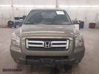 2007 Honda Pilot EX-L with VIN 2HKYF18767H538207, listed as a IAAI auction lot 41747624 with 214,026 mi miles. Bid and sale history available at carsss.com. Image 13.