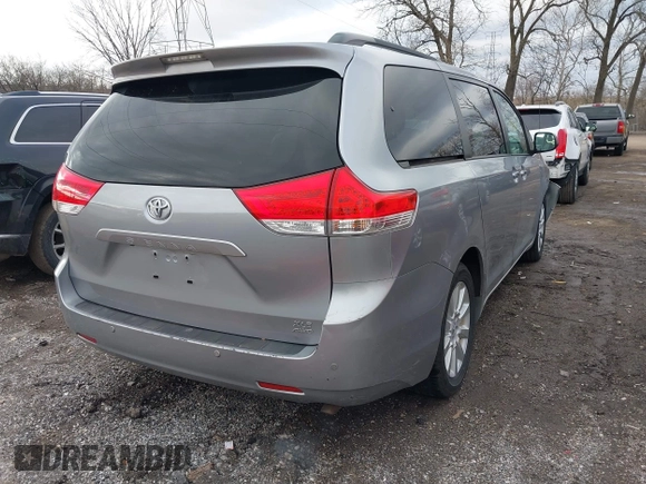 2013 Toyota Sienna XLE with VIN 5TDDK3DC7DS056599, listed as a IAAI auction lot 41736510 with 120,230 mi miles and . Bid and sale history available at DreamBid. Image 4.