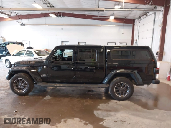 2020 Jeep Gladiator Overland with VIN 1C6HJTFG5LL140142, listed as a IAAI auction lot 42452310 with 111,884 mi miles and . Bid and sale history available at DreamBid. Image 14.