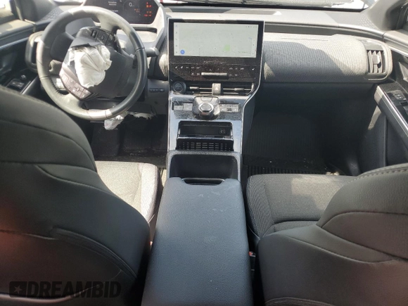 2024 Toyota bZ4X XLE with VIN JTMABACA4RA056975, listed as a Copart auction lot 58435305 with 24,205 mi miles and Salvage title. Bid and sale history available at DreamBid. Image 8.
