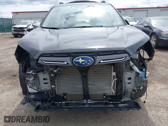 2023 Subaru Forester Touring with VIN JF2SKARC4PH485522, listed as a IAAI auction lot 42544425 with 38,872 mi miles and . Bid and sale history available at DreamBid. Image 6.