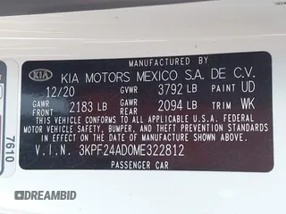 2021 Kia Forte LXS with VIN 3KPF24AD0ME322812, listed as a IAAI auction lot 42317017 with 86,216 mi miles and . Bid and sale history available at DreamBid. Image 9.