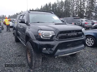 2014 Toyota Tacoma with VIN 3TMLU4EN1EM145498, listed as a IAAI auction lot 41190317 with 120,146 mi miles and . Bid and sale history available at DreamBid. Image 1.