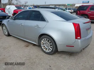 2012 Cadillac CTS Sedan Luxury with VIN 1G6DG5E58C0144837, listed as a IAAI auction lot 41802370 with 184,670 mi miles. Bid and sale history available at carsss.com. Image 3.