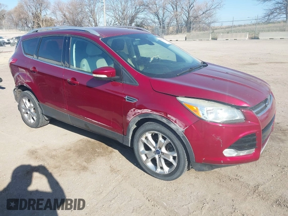 2014 Ford Escape Titanium with VIN 1FMCU9J98EUC24857, listed as a IAAI auction lot 41973037 with 160,634 mi miles. Bid and sale history available at carsss.com. Image 1.