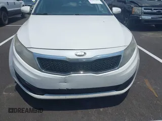 2013 Kia Optima EX z VIN 5XXGN4A70DG121117, wystawiony jako IAAI lot #42387582 z przebiegiem 314 327 mil mil oraz . Historia ofert i sprzedaży dostępna na DreamBid. Obrazek 6.