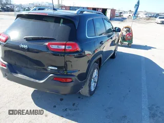 2016 Jeep Cherokee Latitude with VIN 1C4PJLCB8GW330017, listed as a IAAI auction lot 41444346 with 354,212 mi miles. Bid and sale history available at carsss.com. Image 4.