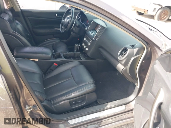 2014 Nissan Maxima SV with VIN 1N4AA5AP2EC447824, listed as a IAAI auction lot 42481206 with 157,540 mi miles and . Bid and sale history available at DreamBid. Image 5.