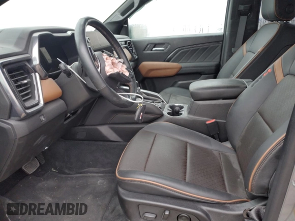 2023 GMC Canyon 4WD AT4 with VIN 1GTP6DEK1P1263245, listed as a Copart auction lot 83553294 with 0 mi miles and Salvage Title. Bid and sale history available at carsss.com. Image 7.