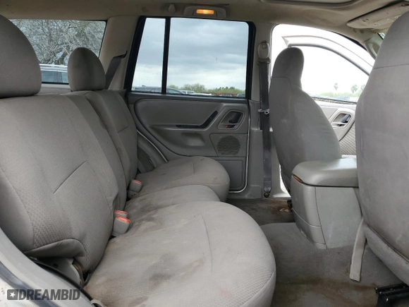 2004 Jeep Grand Cherokee Laredo with VIN 1J4GX48S14C231995, listed as a Copart auction lot 47069175 with 230,062 mi miles and Salvage Title. Bid and sale history available at carsss.com. Image 11.