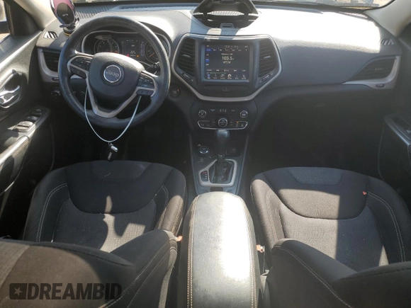2015 Jeep Cherokee North with VIN 1C4PJMCSXFW582677, listed as a Copart auction lot 67999984 with 220,045 mi miles and Salvage Title. Bid and sale history available at carsss.com. Image 8.