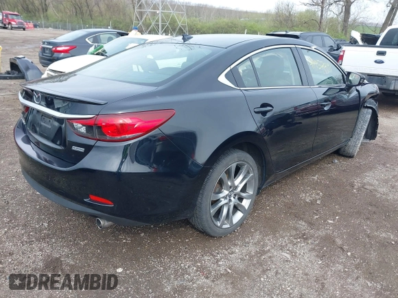 2014 Mazda 6 i Grand Touring with VIN JM1GJ1W62E1157897, listed as a IAAI auction lot 41952291 with 161,255 mi miles. Bid and sale history available at carsss.com. Image 4.