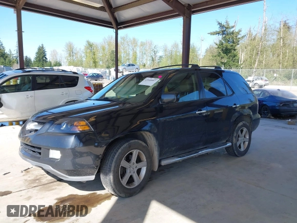 2006 Acura MDX Touring RES w/Navi with VIN 2HNYD18996H520308, listed as a IAAI auction lot 42040007 with 220,146 mi miles. Bid and sale history available at carsss.com. Image 2.