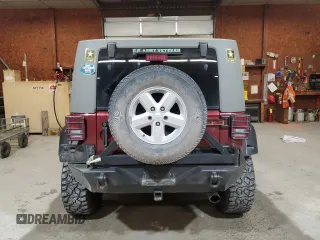 2007 Jeep Wrangler Sahara z VIN 1J4FA54127L132543, wystawiony jako Copart lot #55891995 z przebiegiem 74 616 mil mil oraz Szkoda całkowita • Salvage title. Historia ofert i sprzedaży dostępna na DreamBid. Obrazek 6.