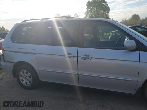 2003 Honda Odyssey EX-L with VIN 5FNRL18973B007802, listed as a IAAI auction lot 40365765 with 278,759 mi miles and . Bid and sale history available at DreamBid. Image 14.