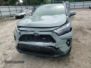 2023 Toyota RAV4 Hybrid XLE Premium with VIN JTMB6RFV8PD097109, listed as a Copart auction lot 59970995 with 43,197 mi miles and Salvage title. Bid and sale history available at DreamBid. Image 13.