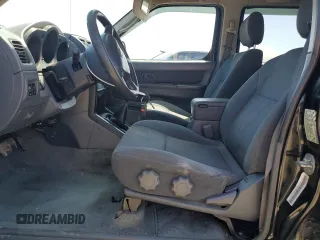2004 Nissan Frontier XE with VIN 1N6ED27T84C446811, listed as a Copart auction lot 54988415 with 172,655 mi miles and Salvage title. Bid and sale history available at DreamBid. Image 7.