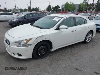 2014 Nissan Maxima S with VIN 1N4AA5AP7EC499224, listed as a IAAI auction lot 42014369 with 74,399 mi miles and . Bid and sale history available at DreamBid. Image 2.