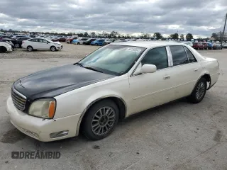 2003 Cadillac DeVille DHS z VIN 1G6KE57Y23U267952, wystawiony jako Copart lot #80736904 z przebiegiem 216 825 mil mil oraz Czysty tytuł • Clean title. Historia ofert i sprzedaży dostępna na DreamBid. Obrazek 1.